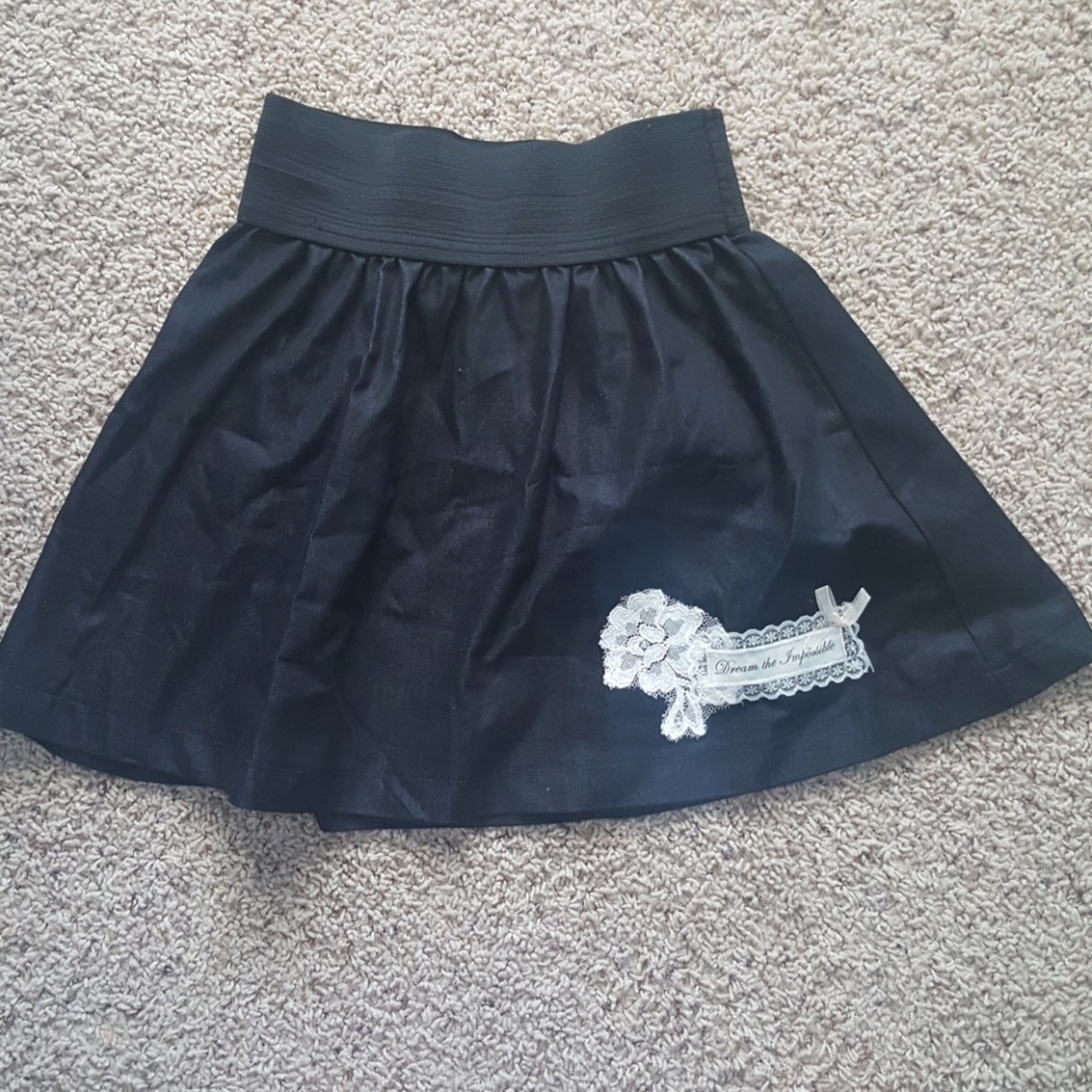 Small black embellished skirt